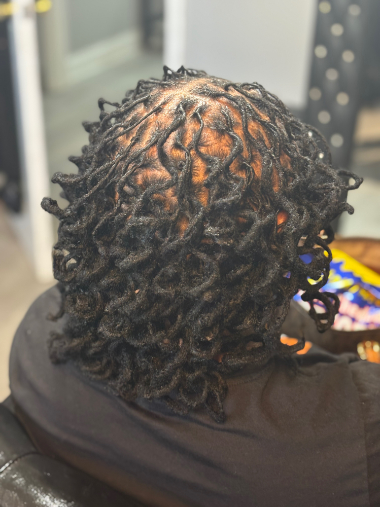 Loc Retwist With Curls
