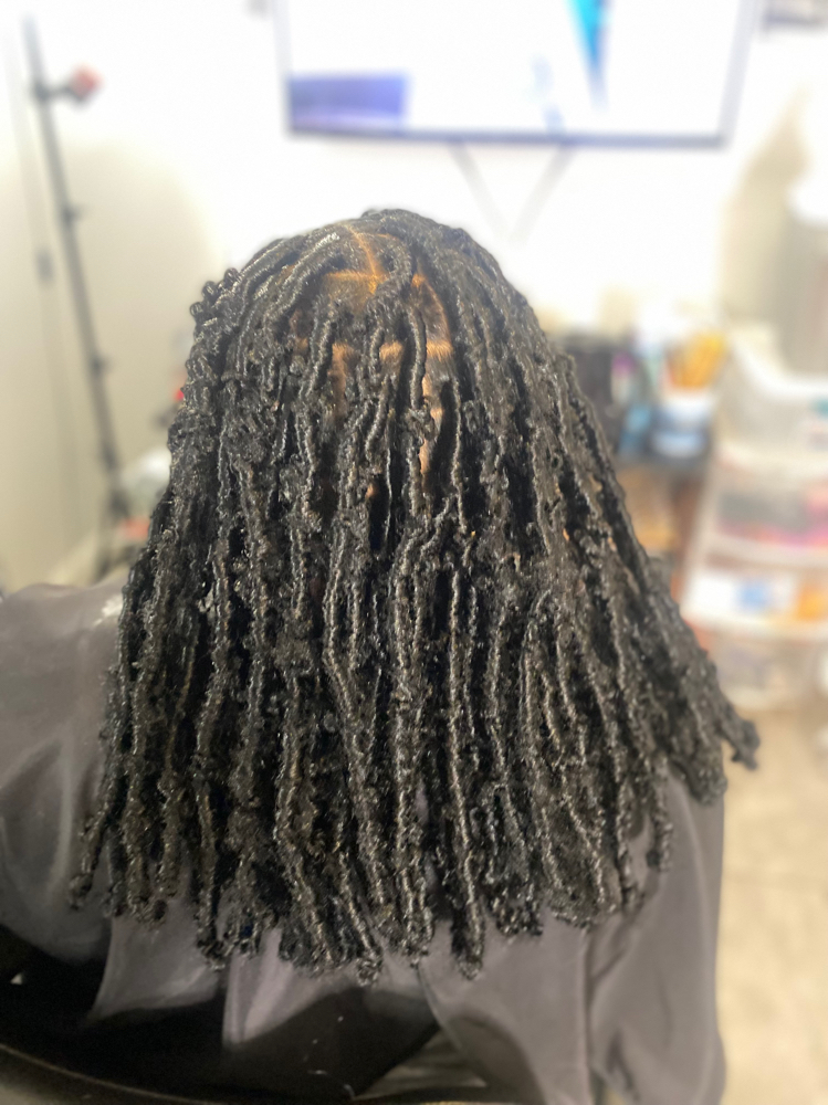 Buttlerfly locs (mid-back length)