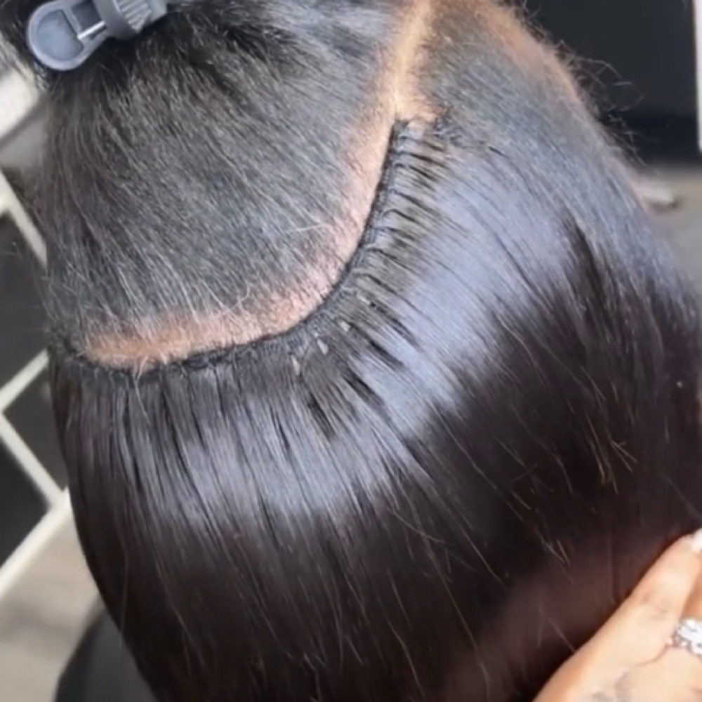 Sew-in Lux packages at SHE Shop Co. in Lansing, MI