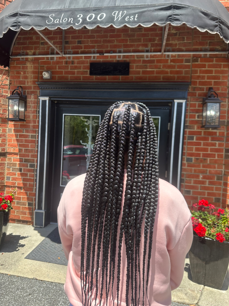 Traditional Box Braids at Règne Royale in Greenville, NC