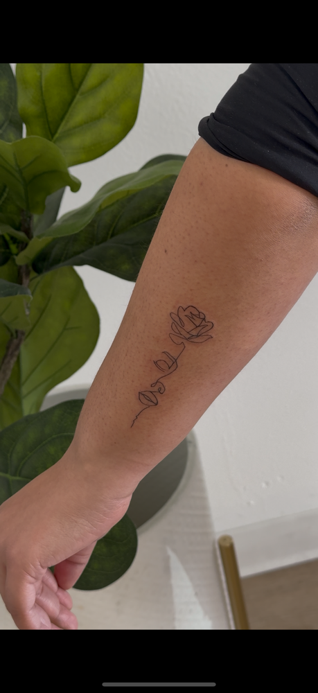 Fine Line Tattoo