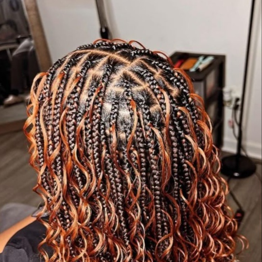 Boho knotless braids/French curls at T.S.K hair and braiding