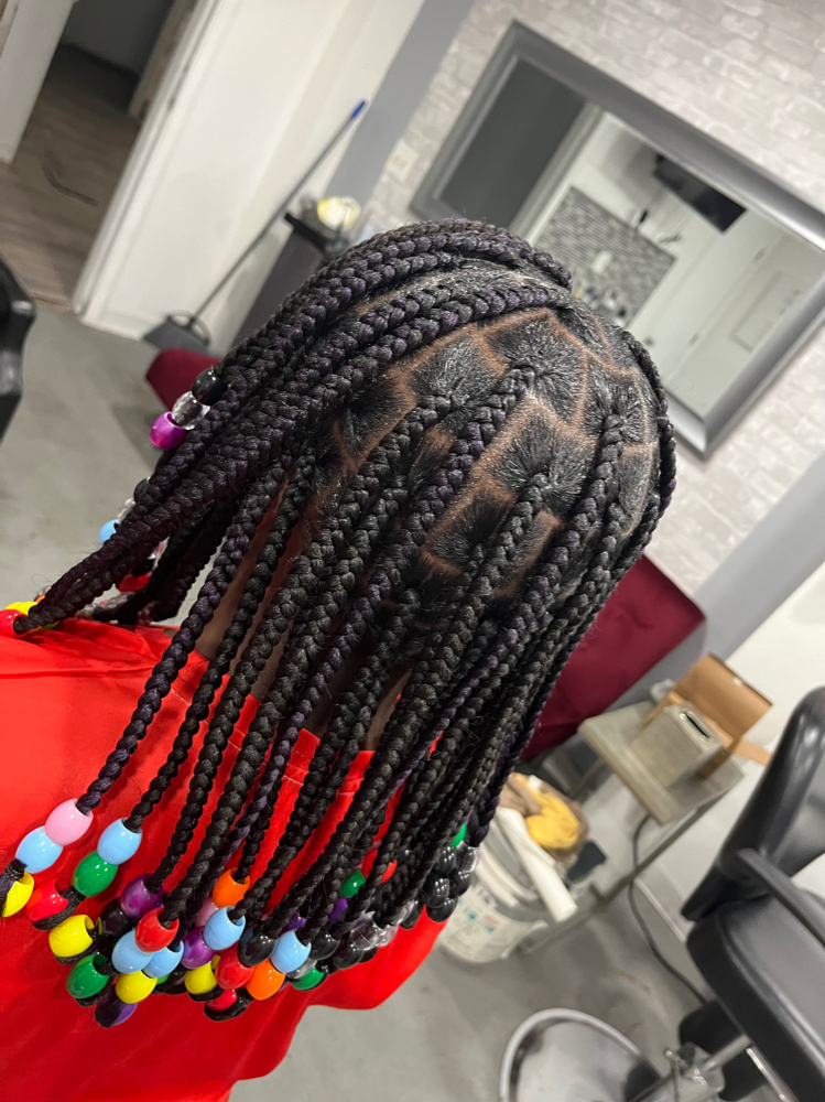 kids knotless with beads at The Hairapist Experience in Mount morris, MI