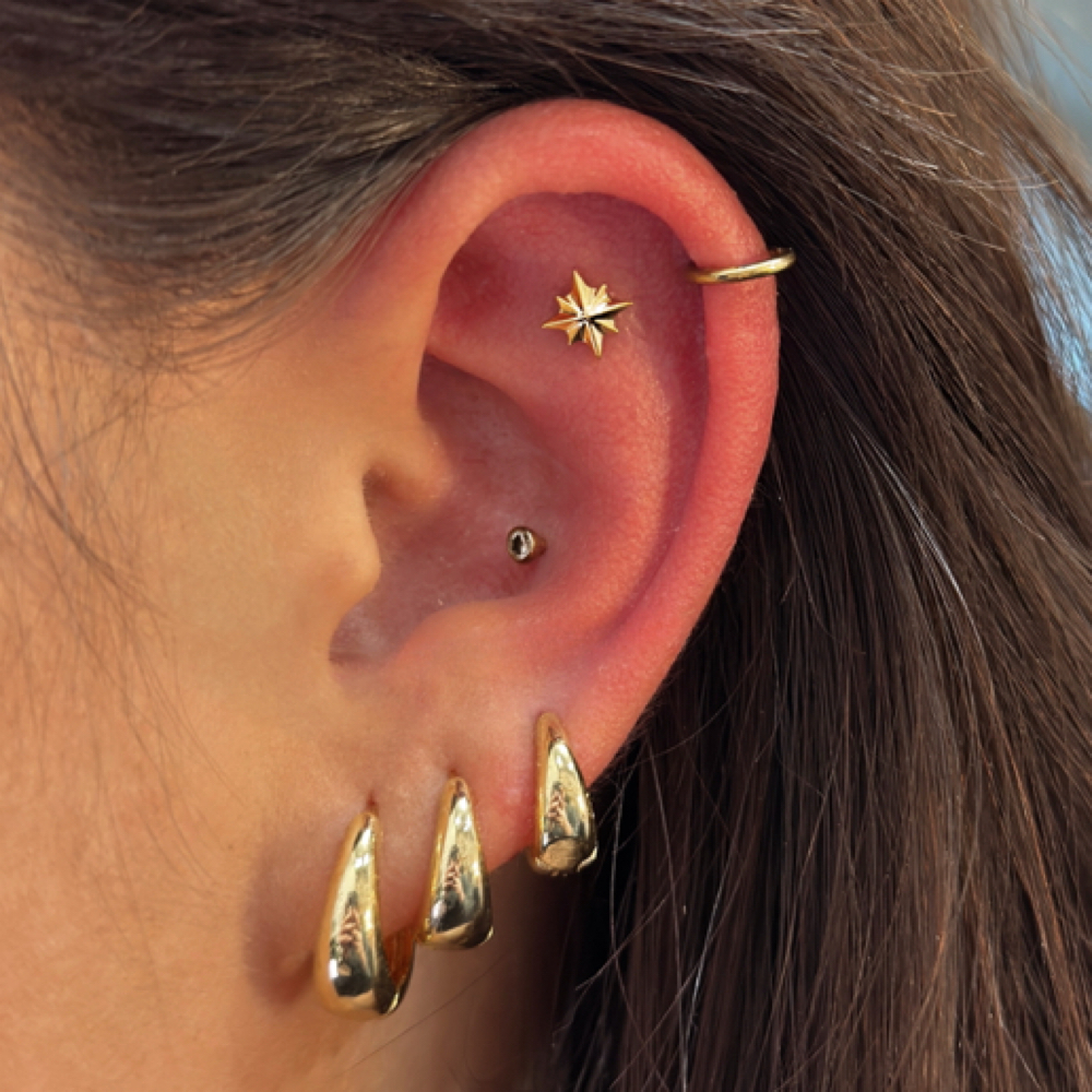 Flat piercing at Monarch Piercing Studio in Logan, UT