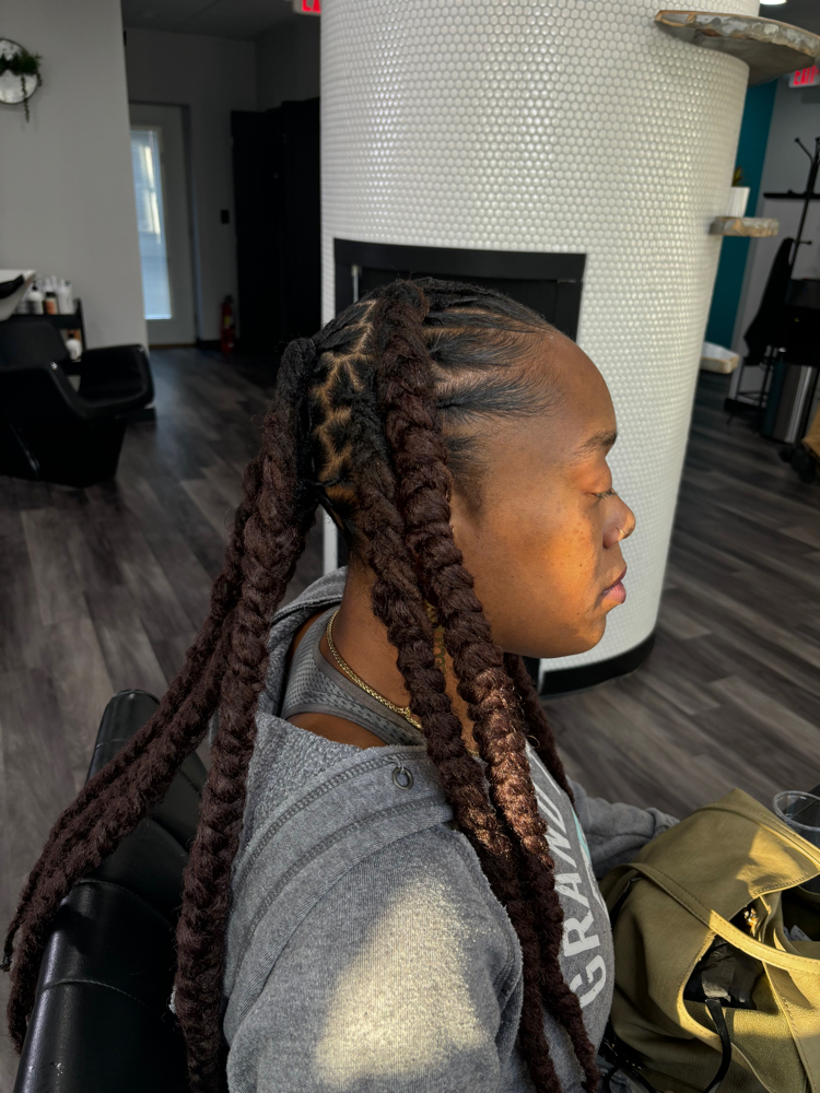 Jumbo braided ponytails