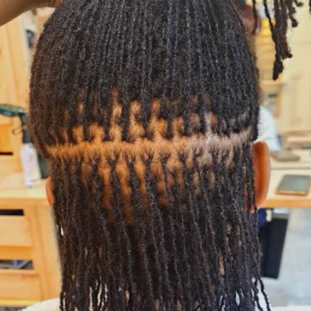 Sisterlocs at Ecstatic Crowns in Inglewood, CA