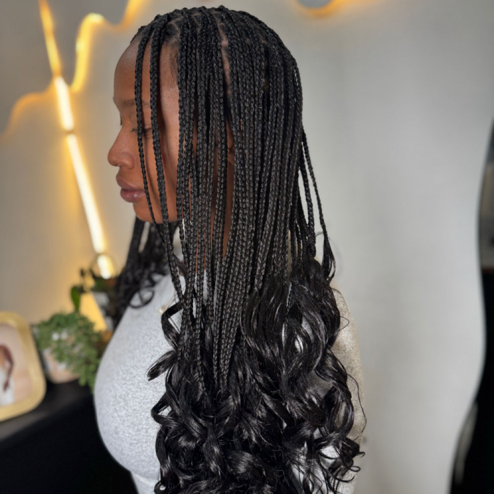 French Curl Knotless Midback at Zara Hair Braiding Salon in 30328