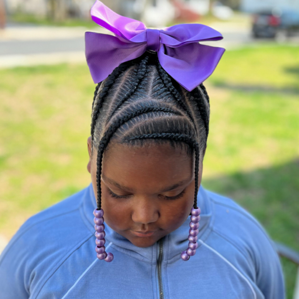 Kiddie braids( no hair added) at Taylored Image in Delmar, DE