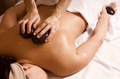 Hot stone massage at Lotus Therapeutics Massage in Grand Junction, CO