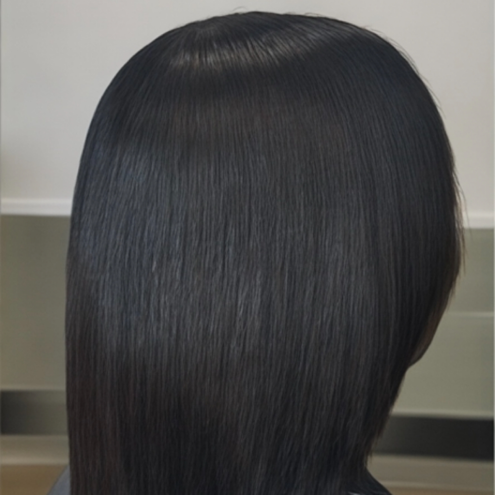 Smoothing Treatment & Silk Press at Beauty by Kreme LLC in Buford, GA