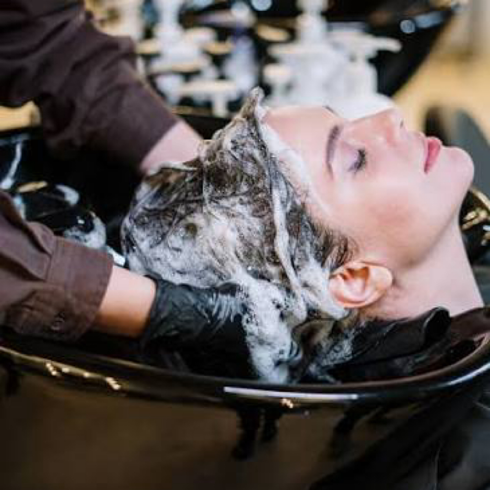 Shampoo at Ember & Ivy Salon in Henderson, TN