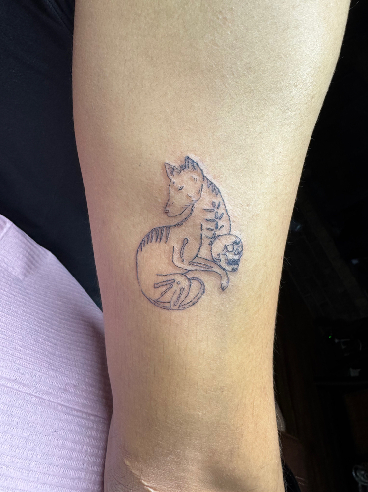 One small tattoo
