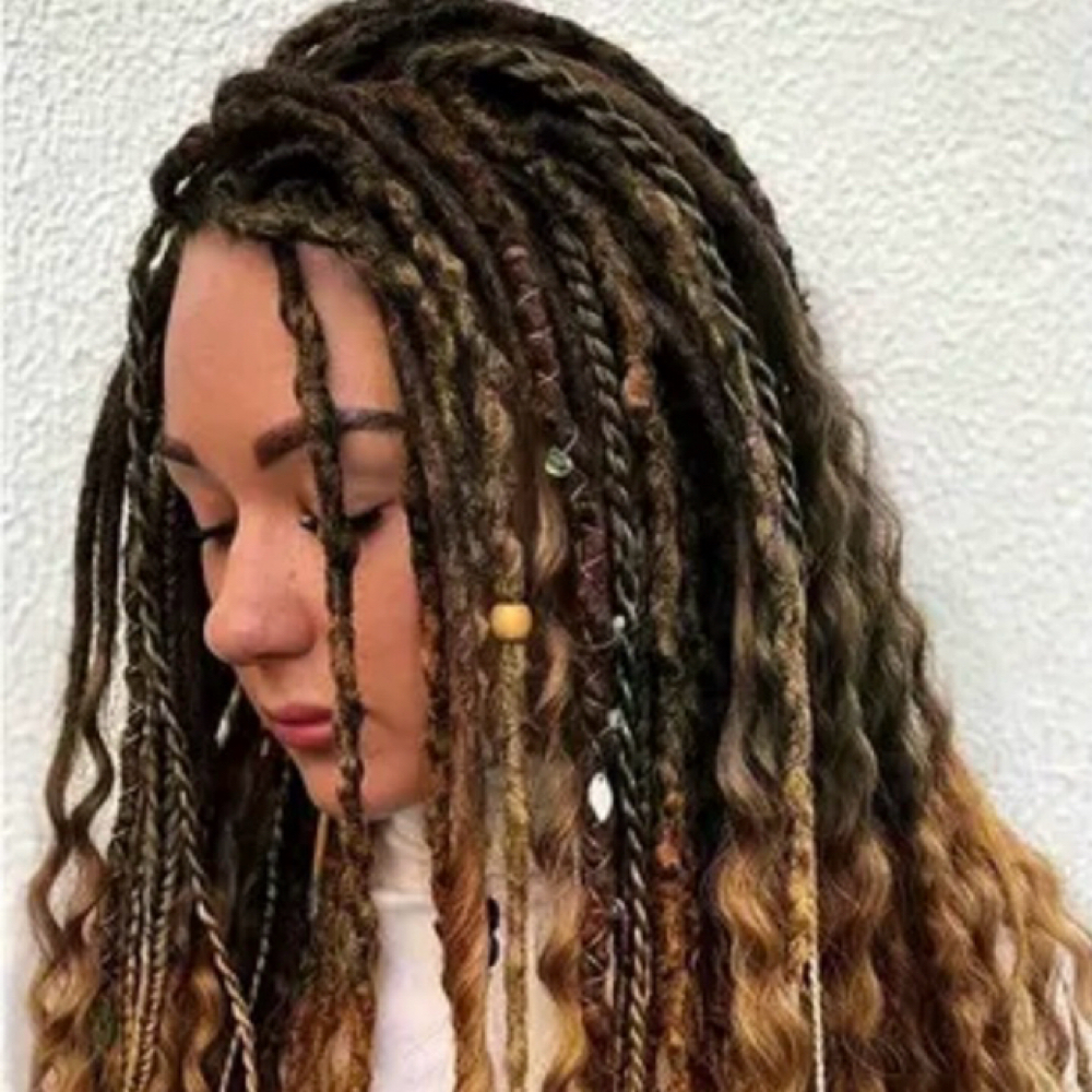 Braided In Dreads at Blended Edge Salon in Great Falls, MT