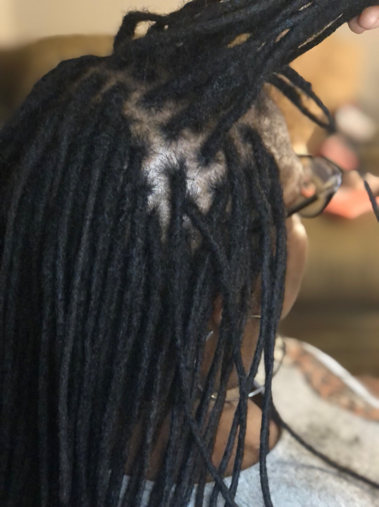 Loc Extension TouchUp (Retwist) at Touched By Angel in Stockton, CA