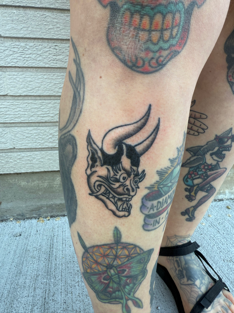 Black and Grey Apprentice Tattoo