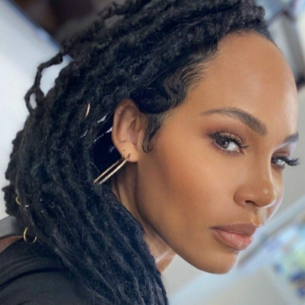 Faux Lock Lower Back at Zara Hair Braiding Salon in 30328