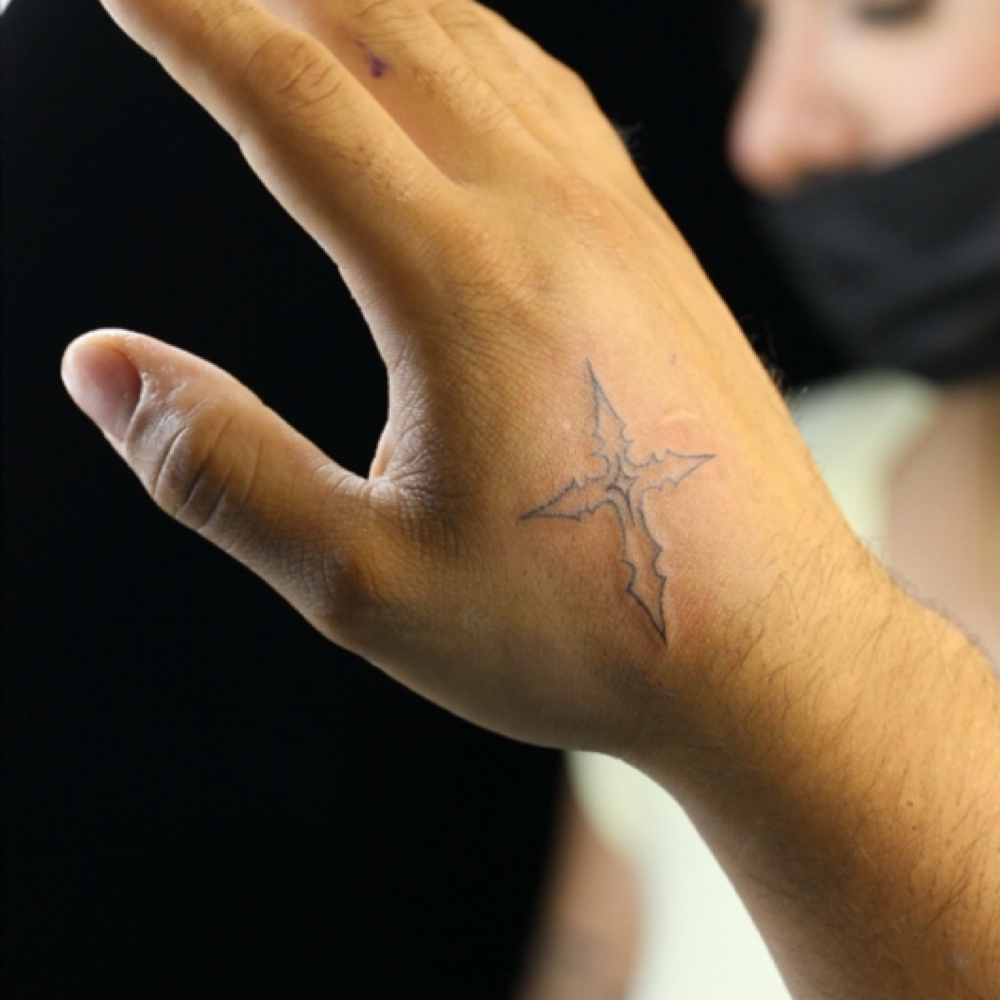 Tiny Fine Line Tattoo at Hello Beautyyy in Shawnee, KS