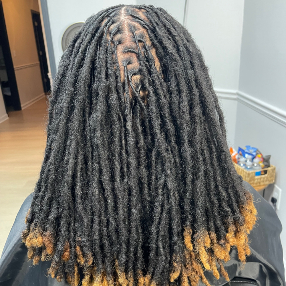 Loc Retwist (ONLY) at Naturally Glitz Beauty Salon & Boutique in Newnan, GA