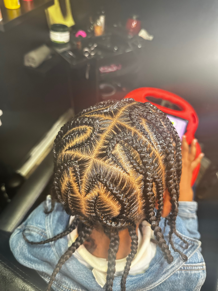 Boys Stitch Braids With a Designn