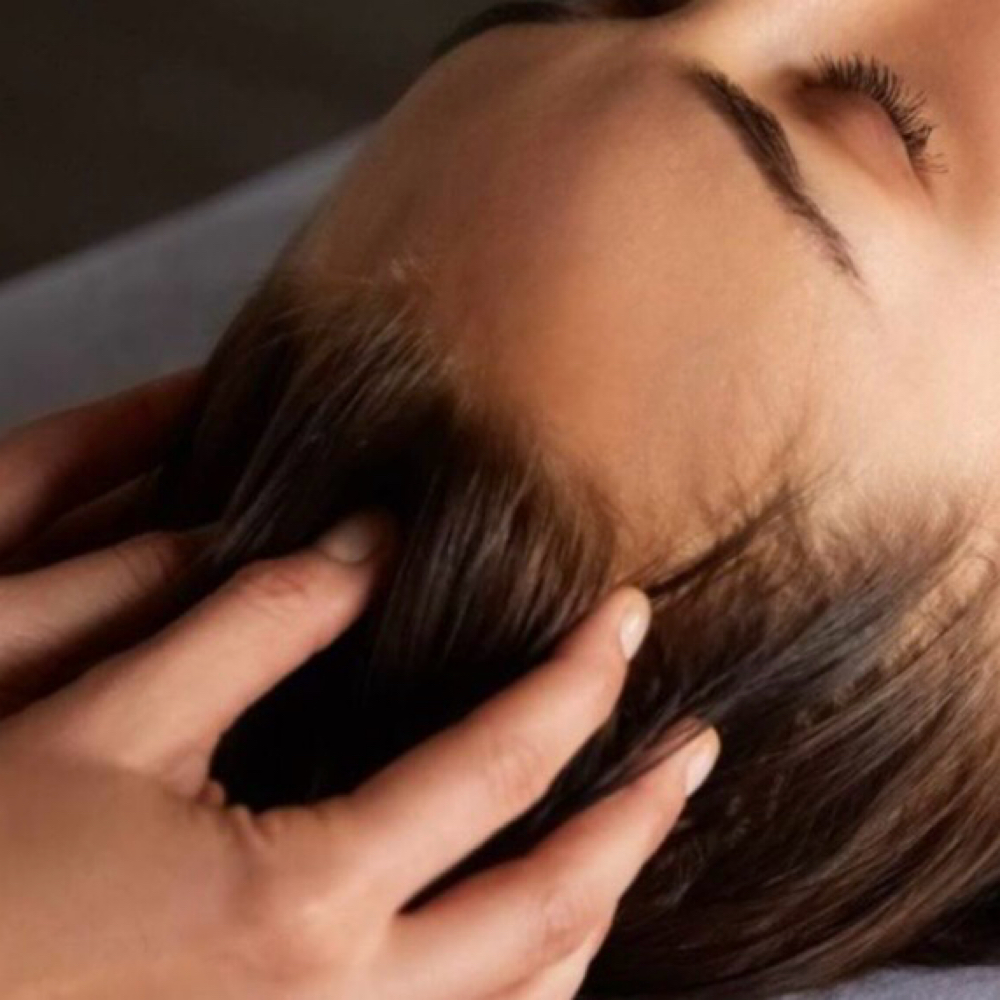 Scalp massage at Nouvèl Beauty Collective in New London, CT