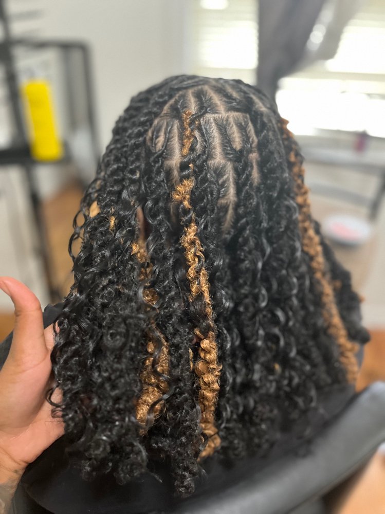 Above Shoulder Invisible Locs at BraidsByJinece in Wichita, KS