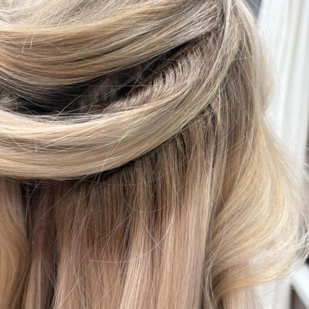 Hand-Tied Extension Move Up at Emerald and Opal Salon in Tucson, AZ