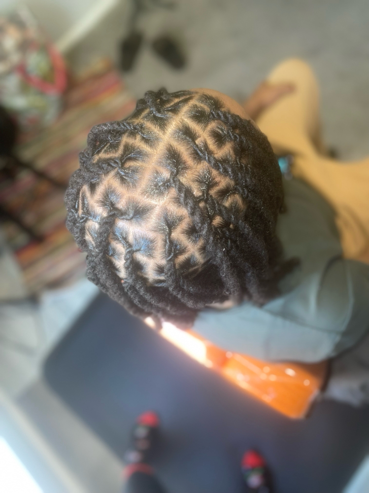Retwist & Style ( Shoulder length ) at Oozie Locs in Temple Hills, MD