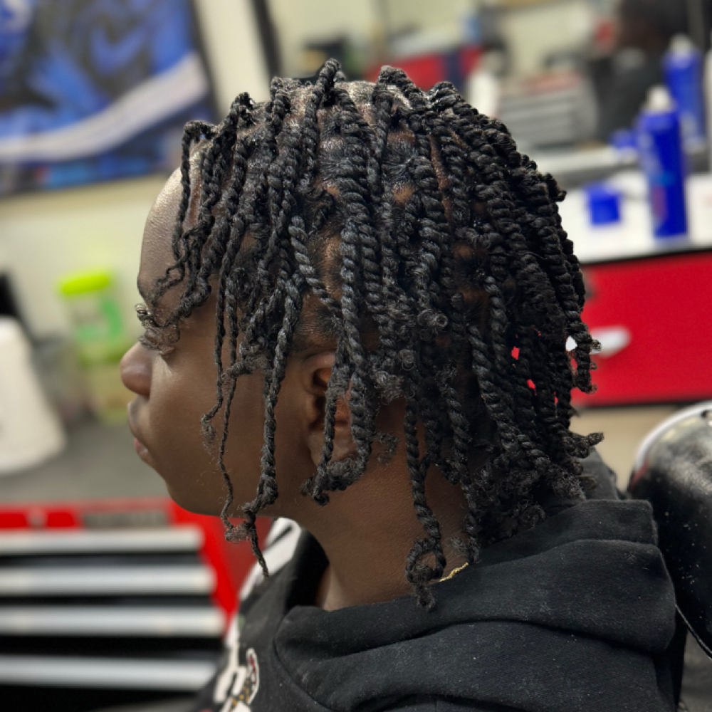 KUDI Medium Two Strand Twist at Man Cave Retreat Barbershop in Fort Myers, FL