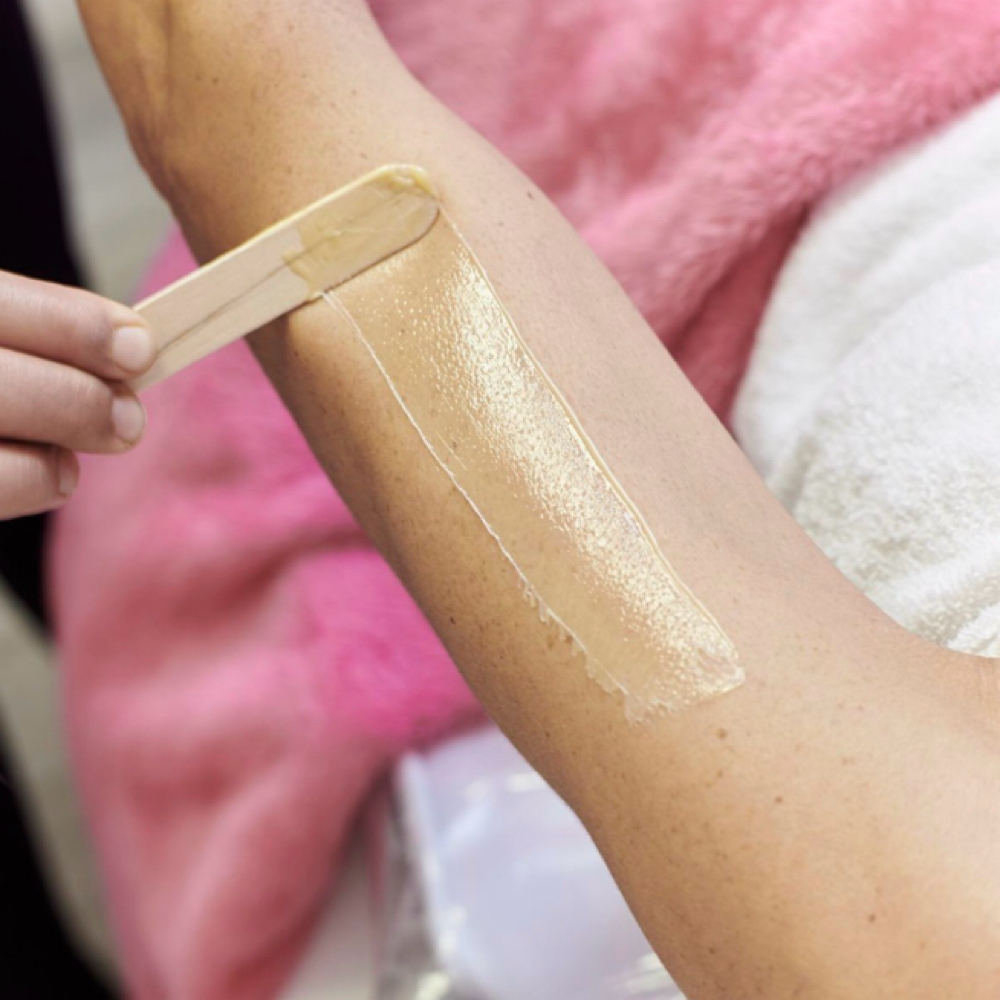 Body Waxing: Half Arm at Nyah Simone Spa in Garden City, NY