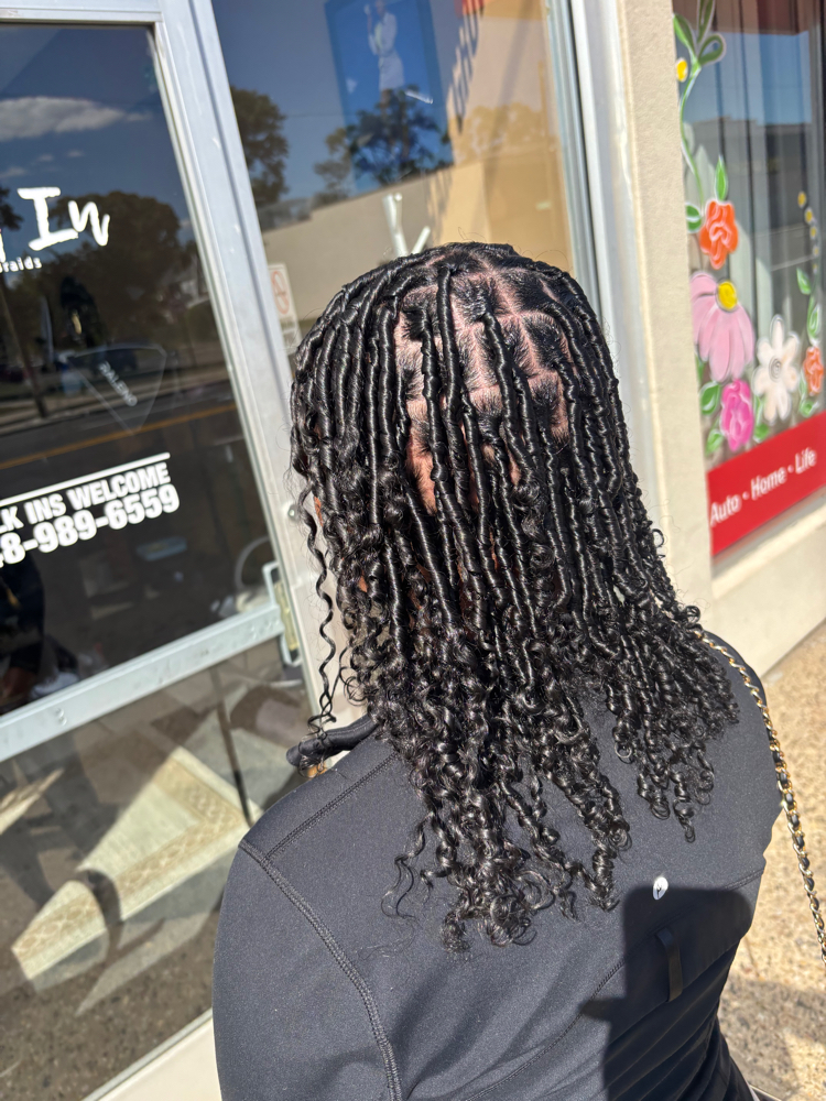 Starter Locs Long at Queen Of Diamond Locs in Detroit, MI
