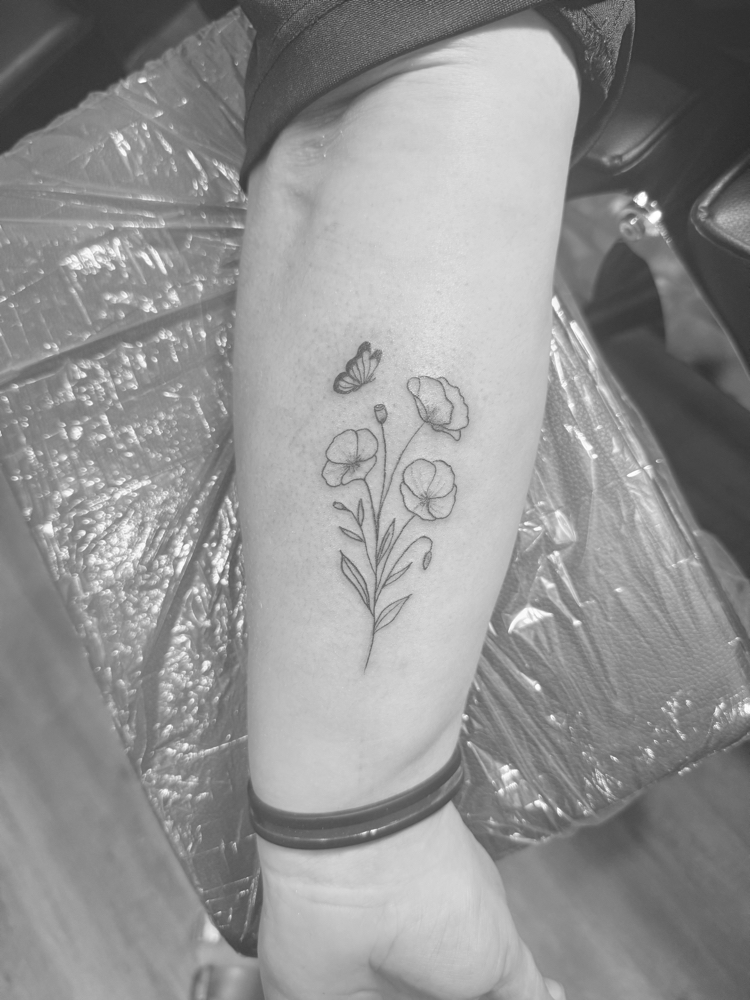 Fine Line Tattoo