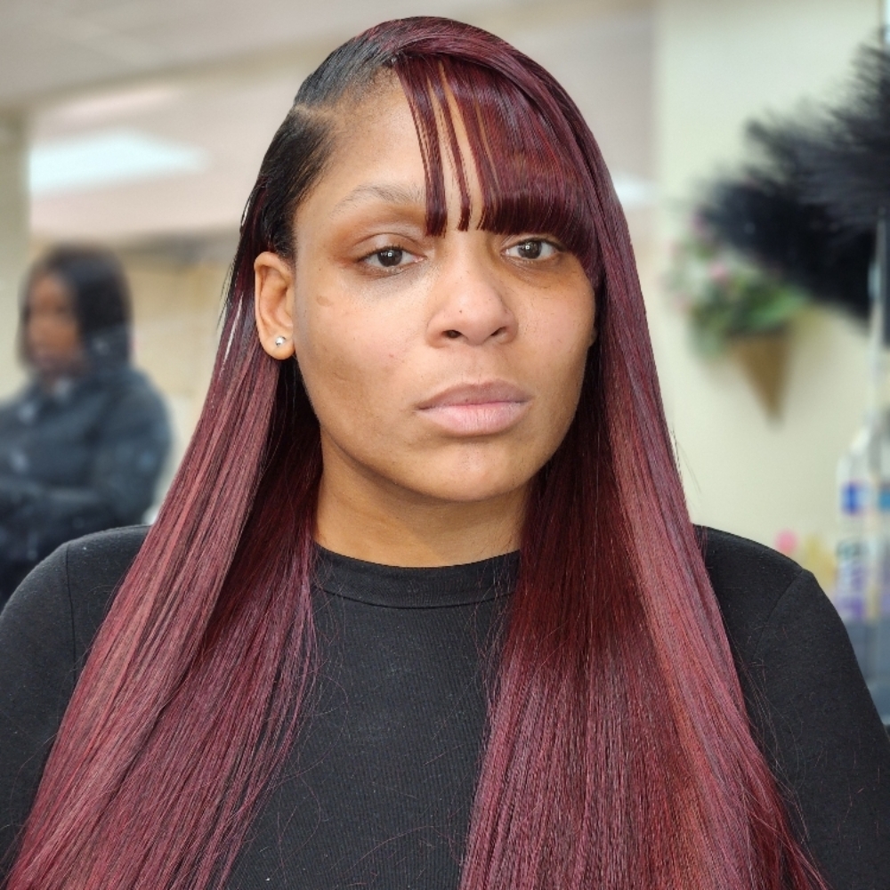 Sewing Weave at MaryamuAfricanbraids in Newark, NJ