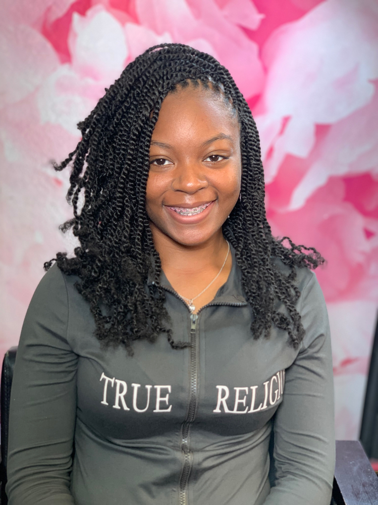 S. Kinky Twist Midback at The Braid Bar in Orlando, FL