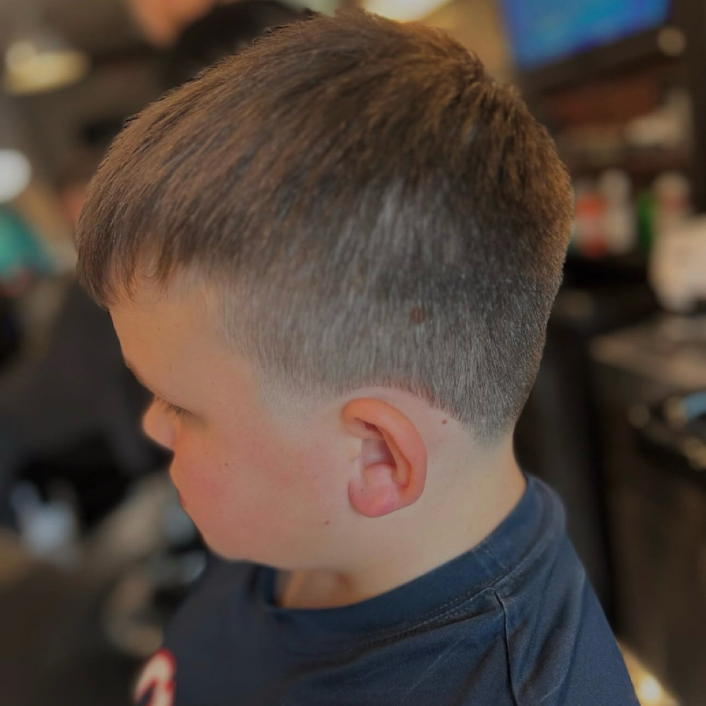 Kids Haircuts (ages 12 & Under) at Smiley tha Female Barber in Cincinnati, OH