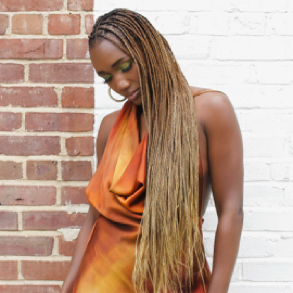 Retouch Knottless Mid Back at Zara Hair Braiding Salon in 30328