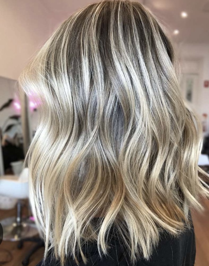 Full Custom Blonding at Ellie's Elevated Hair Solutions at Bowie and Byers Salon in Fort Worth, TX