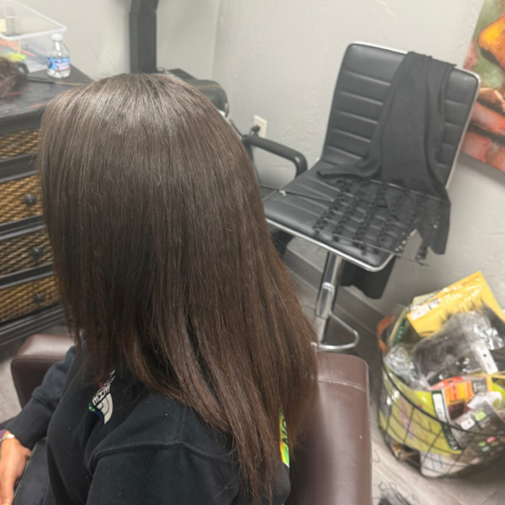 Sew-in (hair NOT included) at Kombed by Keelea in Edmond, OK