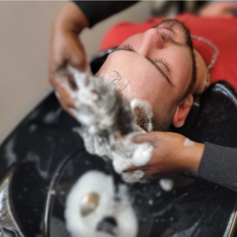 Shampoo at Passionate Creations Hair Salon LLC in Cary, NC