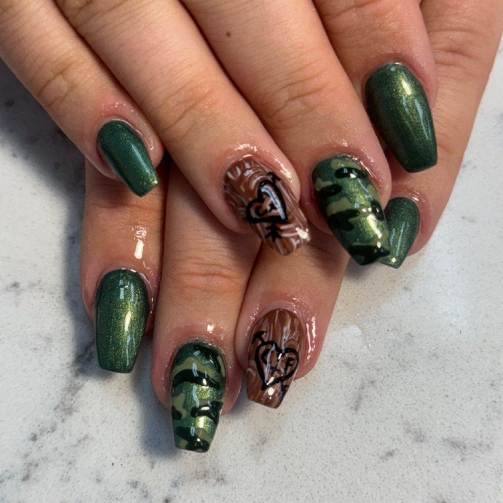 Intricate nail design (per finger) at Aura by Mary in hampstead, NC
