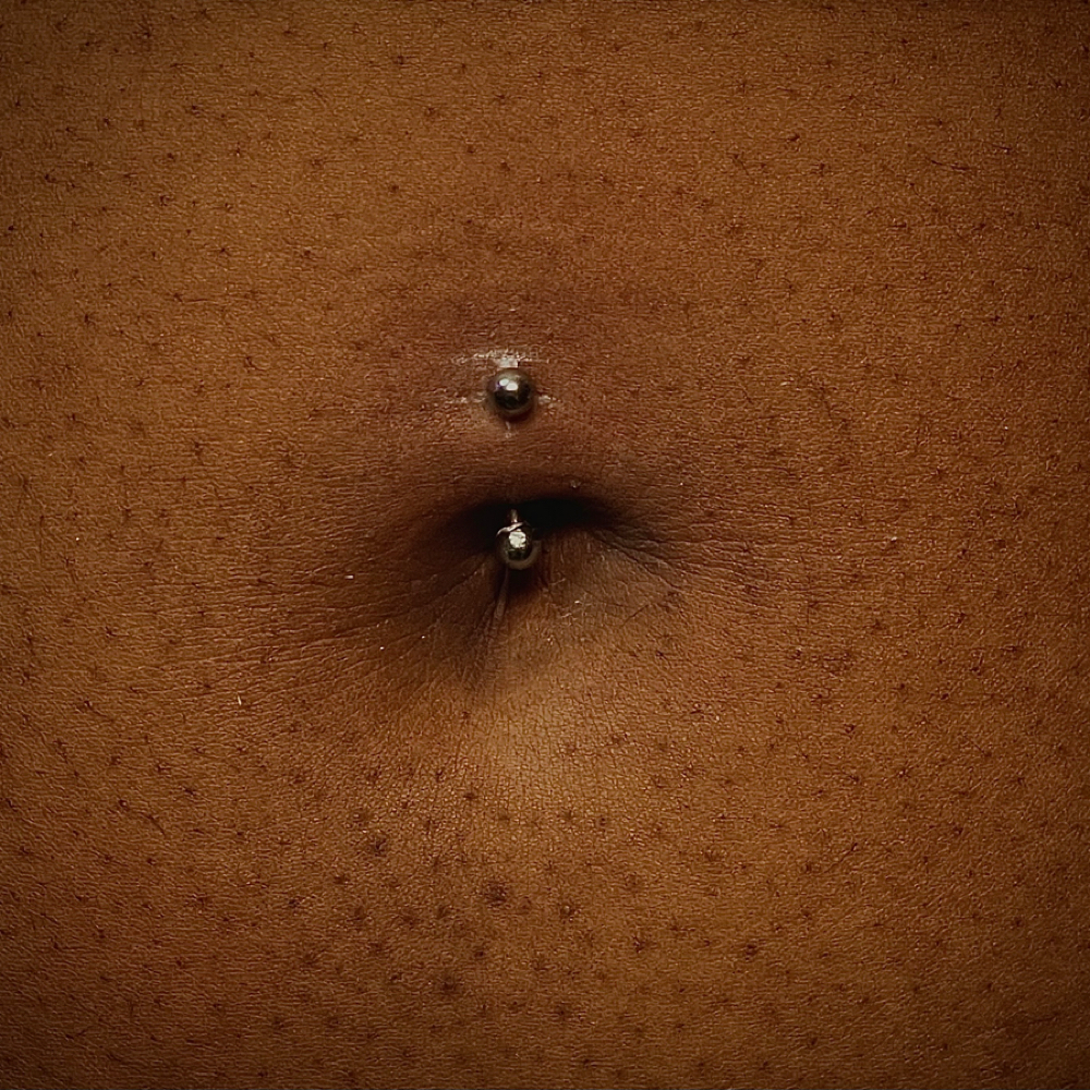 Navel at Dark Age Piercings by Sarah in Denton, TX