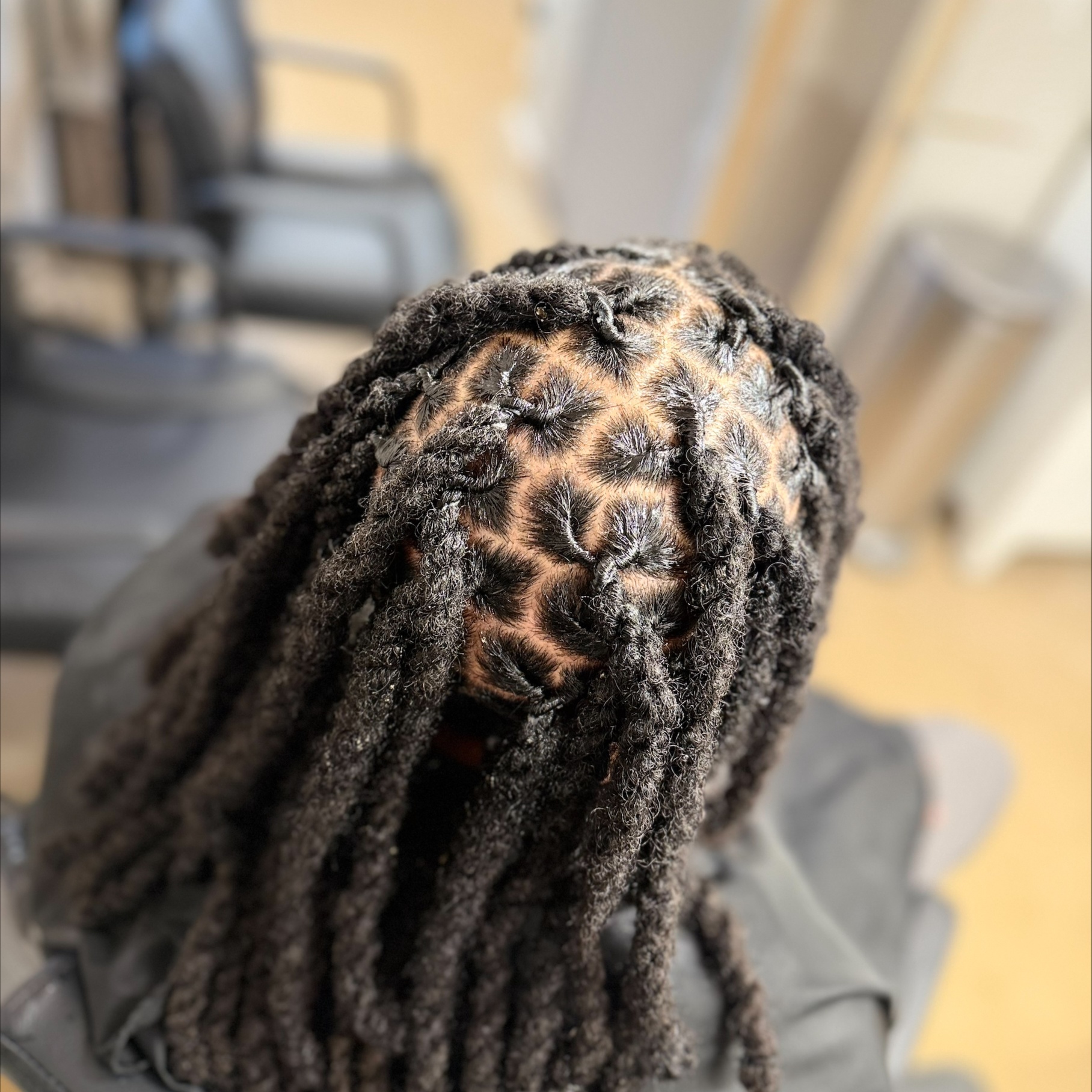 Loc Retwist with Two Strand Twists at Loc’d Artis in Waverly, VA