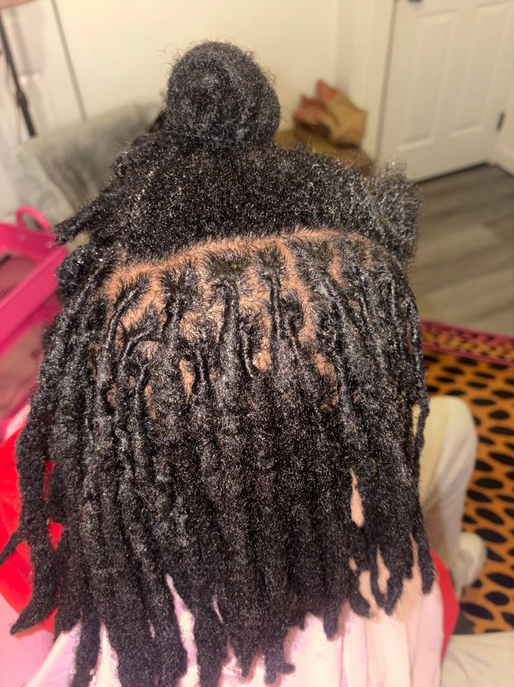 Loc Retwist at Hairbykenz406 in Missoula, MT
