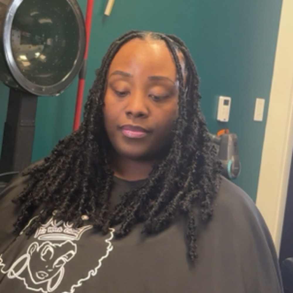 Butterfly locs at Sit With Cham in Charlotte, NC