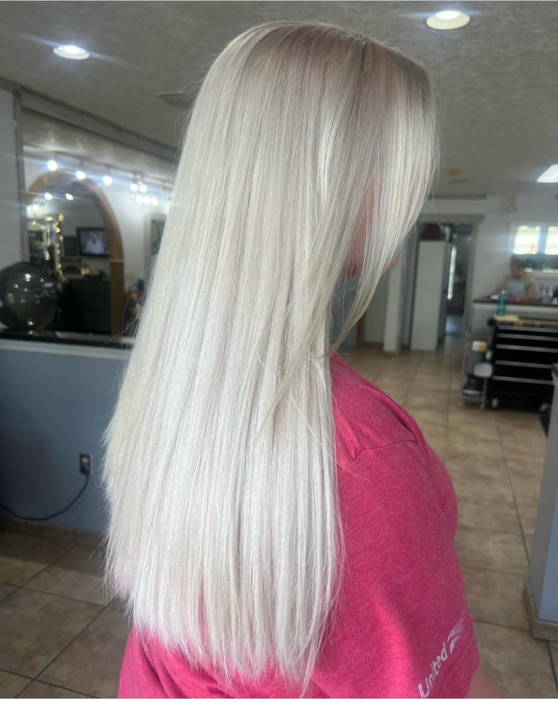 Bleach ReTouch + Cut + Blowdry at Abigail  Chapman in Jacksonville, FL