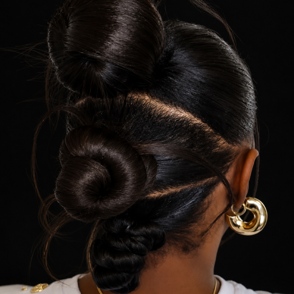 Sleek Sculpted Bun Updo at Thairapy Collection in Washington, DC