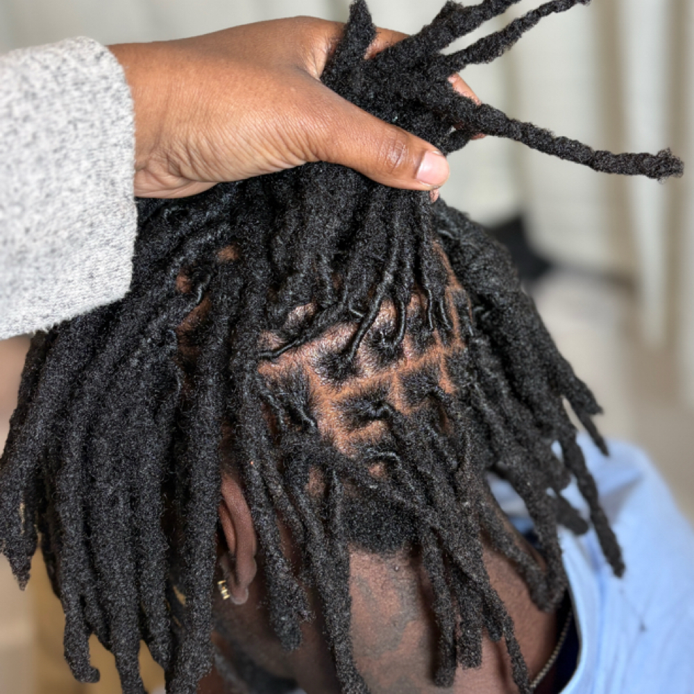 Loc Reattachment at Sacred Locs in Rochester, NY