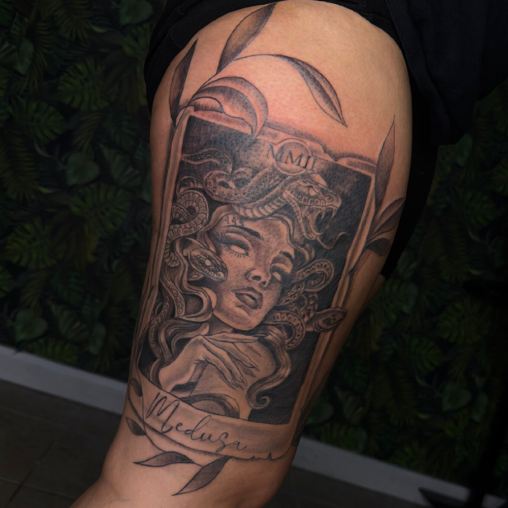 Thigh tattoo at Rilla Tatted it in fayetteville, NC