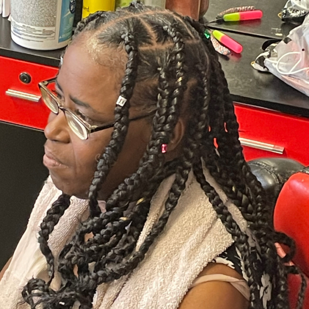 Large Knotless Braids at Lavished.rinaii in Victorville, CA