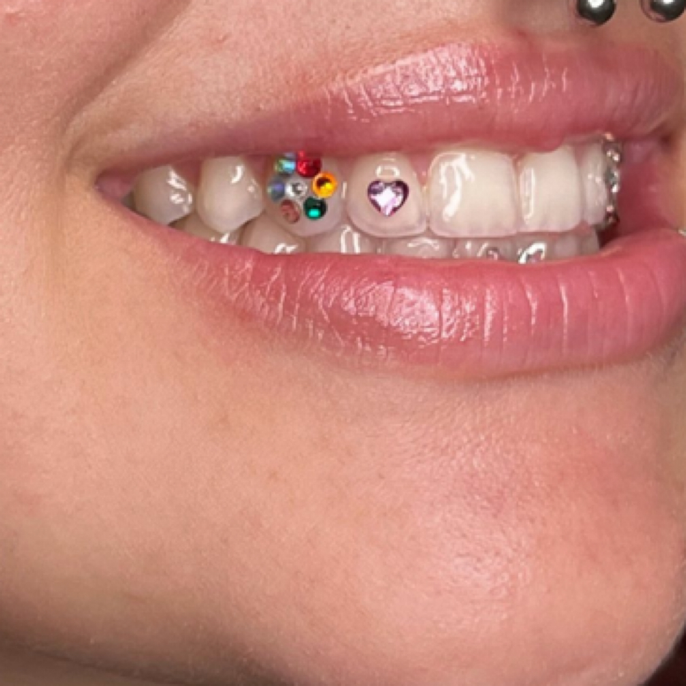 Flower Gem Tooth at Princesaa Piercings x Aesthetics in Chandler, AZ
