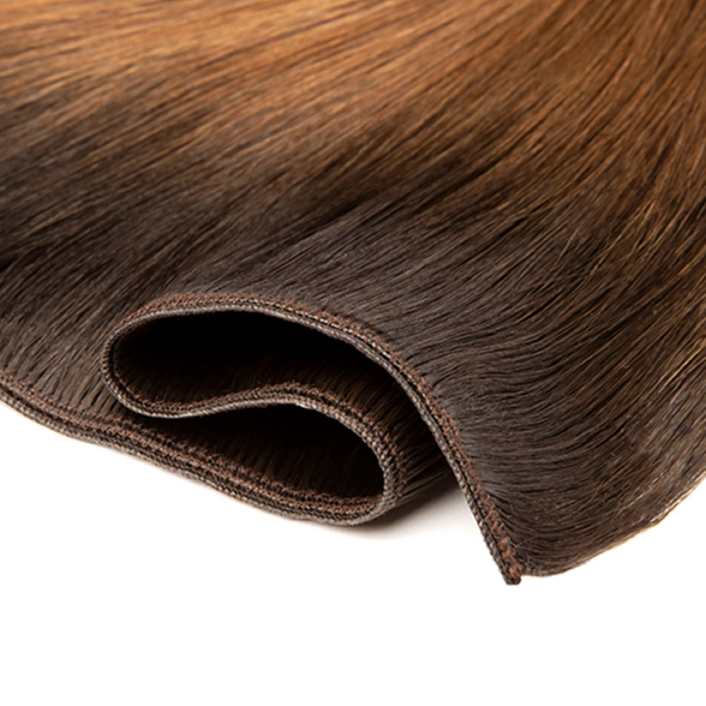 Hand Tied Extension Removal at Tyler & Drew Hair Co. in Marshall, MI
